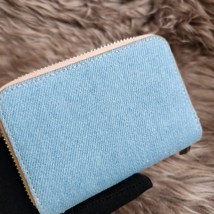 Christian Louboutin
Panettone Pearl Blue Denim Coin Purse